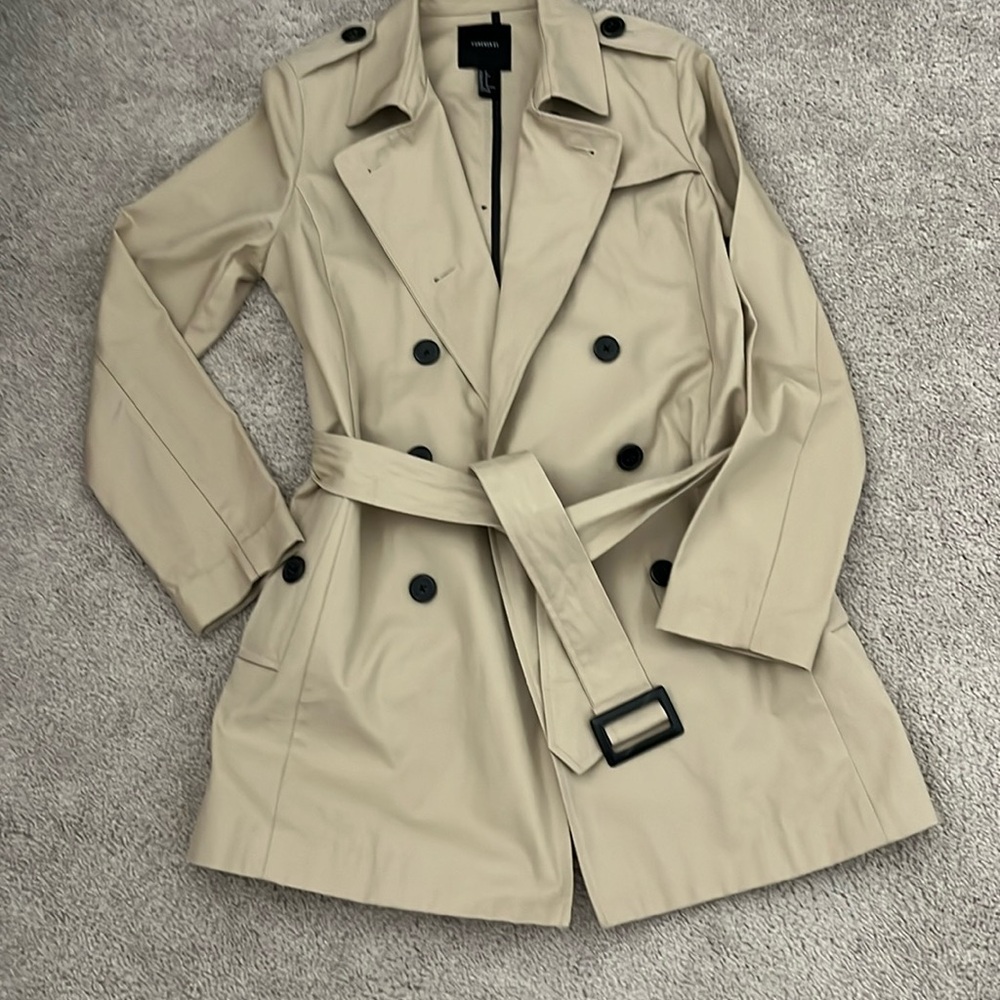 Tan trench coat like new.